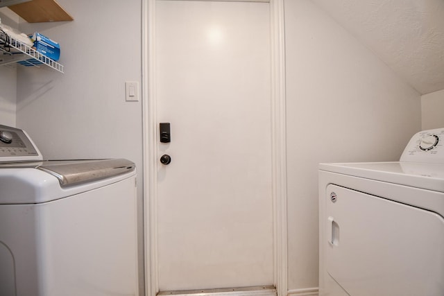 16023 Mission Glen Dr, Houston, TX 77083 - clothes washing area with washing machine and dryer