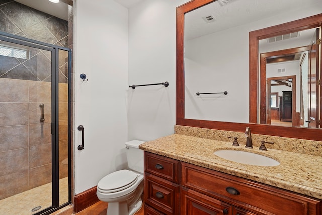 2602 Britton Ridge Dr, Katy, TX 77494 - bathroom featuring vanity, a stall shower, and toilet
