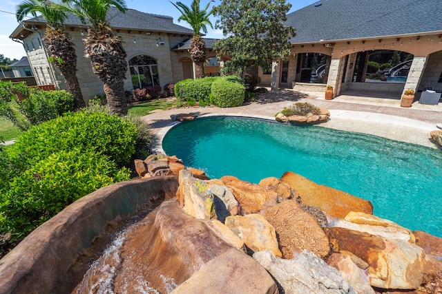 2602 Britton Ridge Dr, Katy, TX 77494 - swimming pool featuring a patio area