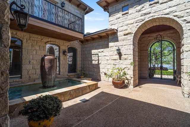 2602 Britton Ridge Dr, Katy, TX 77494 - property entrance featuring stone siding