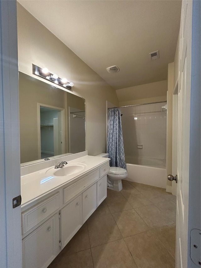 2333 Ann St, Houston, TX 77003 - full bath with tile patterned flooring, toilet, vanity, and shower / bath combo with shower curtain