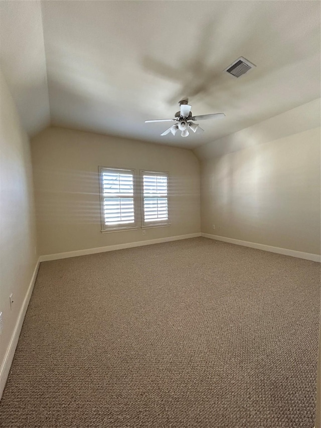 2333 Ann St, Houston, TX 77003 - empty room featuring vaulted ceiling, light carpet, baseboards, and ceiling fan