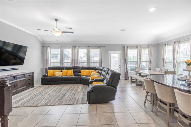 1915 Hays Ranch Dr, Richmond, TX 77469 - living area featuring ornamental molding, a ceiling fan, and light tile patterned floors