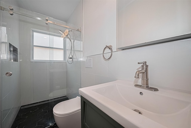 4110 Gramercy St, Houston, TX 77025 - bathroom featuring a stall shower, toilet, vanity, and tile walls