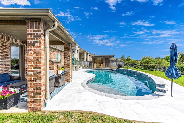 2003 Highland Meadows Dr, Pearland, TX 77089 - view of swimming pool featuring a patio area