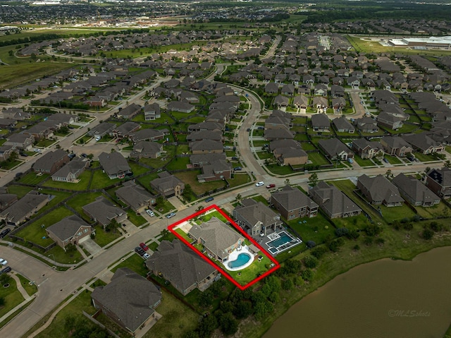 2003 Highland Meadows Dr, Pearland, TX 77089 - aerial perspective of suburban area with property parcel outlined