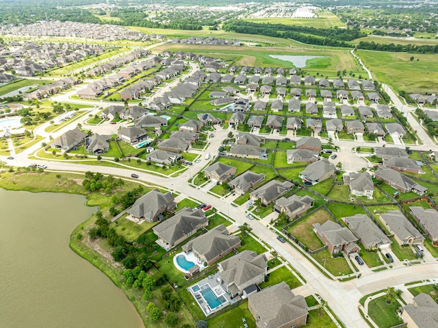 2003 Highland Meadows Dr, Pearland, TX 77089 - aerial overview of property's location with a large body of water and nearby suburban area