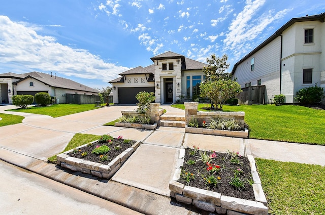 1907 Creekwood Cv, Missouri City, TX 77459 - view of front of property with concrete driveway, a garage, and stone siding