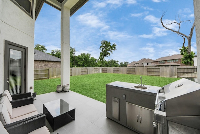 6510 Kangaroo Point Ln, Sugar Land, TX 77479 - view of patio / terrace featuring a sink and a grill