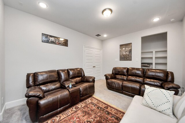 6510 Kangaroo Point Ln, Sugar Land, TX 77479 - carpeted living area featuring recessed lighting, baseboards, and built in shelves