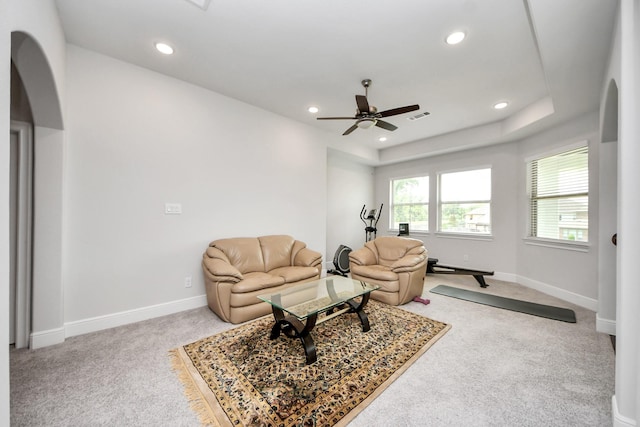 6510 Kangaroo Point Ln, Sugar Land, TX 77479 - living area featuring light carpet, a ceiling fan, arched walkways, recessed lighting, and baseboards