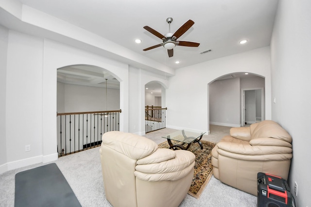 6510 Kangaroo Point Ln, Sugar Land, TX 77479 - living room featuring ceiling fan, recessed lighting, arched walkways, carpet floors, and baseboards