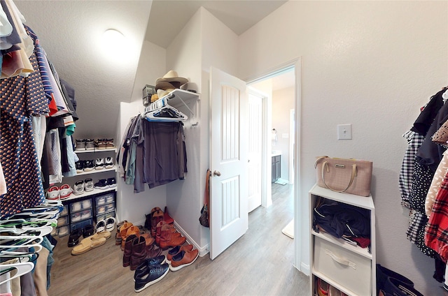 24803 Signorelli Way, Katy, TX 77493 - walk in closet with wood finished floors
