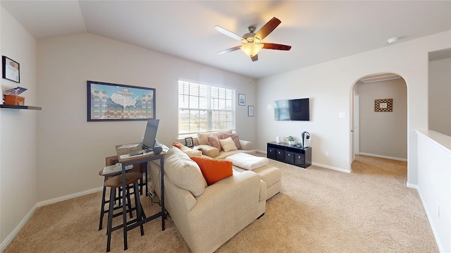 24803 Signorelli Way, Katy, TX 77493 - living room with a ceiling fan, arched walkways, and carpet floors