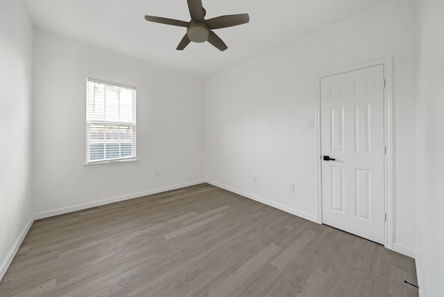 304 Milby St, Houston, TX 77003 - unfurnished room featuring wood finished floors, ceiling fan, and baseboards
