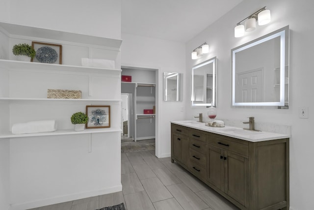 304 Milby St, Houston, TX 77003 - full bathroom with double vanity and a spacious closet