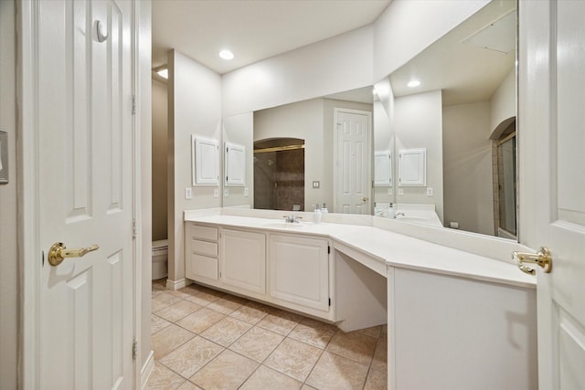 2400 Mccue Rd Unit 230, Houston, TX 77056 - bathroom with a stall shower, toilet, tile patterned floors, vanity, and recessed lighting
