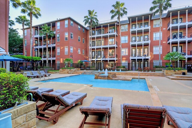 2400 Mccue Rd Unit 230, Houston, TX 77056 - view of pool featuring fence