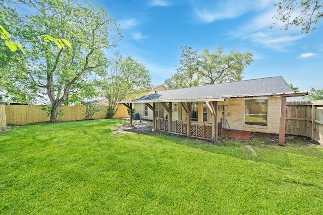 11115 Maple Rock Dr, Humble, TX 77396 - back of property with a patio area and brick siding
