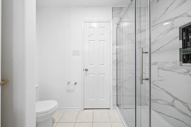 15026 Magnoliabough Pl, Cypress, TX 77429 - full bathroom featuring a marble finish shower, tile patterned floors, and toilet