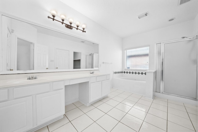 15026 Magnoliabough Pl, Cypress, TX 77429 - full bath with double vanity, a shower stall, a bath, and tile patterned floors