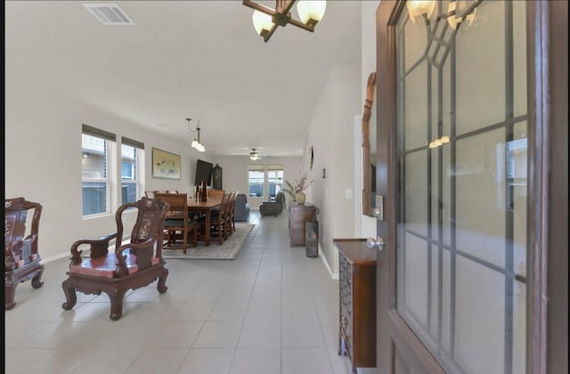 5335 Ivory Glass Dr, Katy, TX 77493 - living area with baseboards and light tile patterned floors