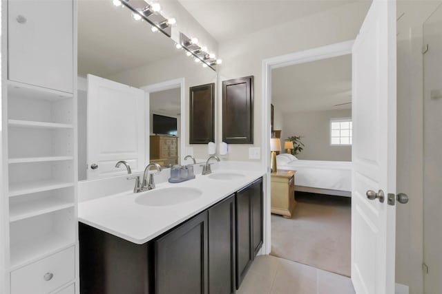 5335 Ivory Glass Dr, Katy, TX 77493 - full bathroom featuring ensuite bathroom, double vanity, and tile patterned floors