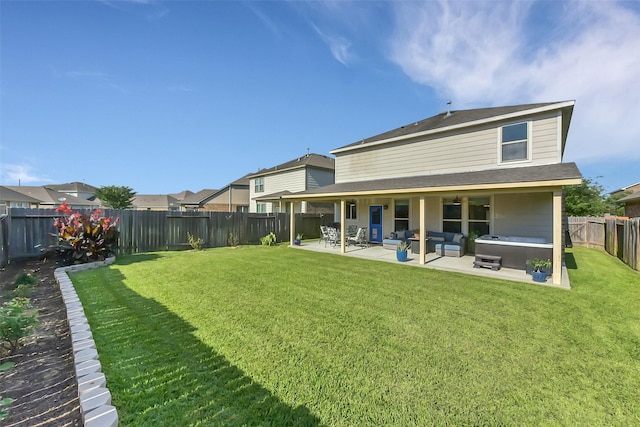 5335 Ivory Glass Dr, Katy, TX 77493 - rear view of house with a patio and an outdoor hangout area