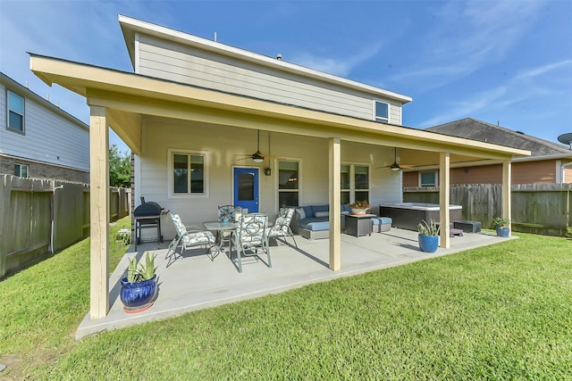 5335 Ivory Glass Dr, Katy, TX 77493 - back of house with a hot tub, a ceiling fan, a patio area, and outdoor lounge area