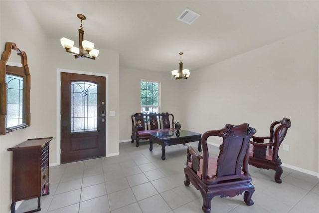 5335 Ivory Glass Dr, Katy, TX 77493 - entrance foyer featuring a chandelier, baseboards, and light tile patterned floors