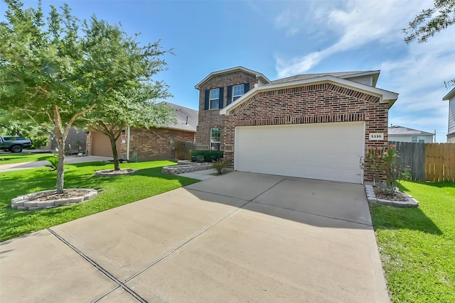 5335 Ivory Glass Dr, Katy, TX 77493 - traditional-style house featuring brick siding, driveway, and an attached garage