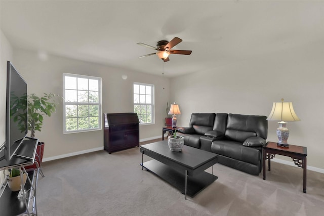 5335 Ivory Glass Dr, Katy, TX 77493 - living area featuring a ceiling fan, baseboards, and carpet floors