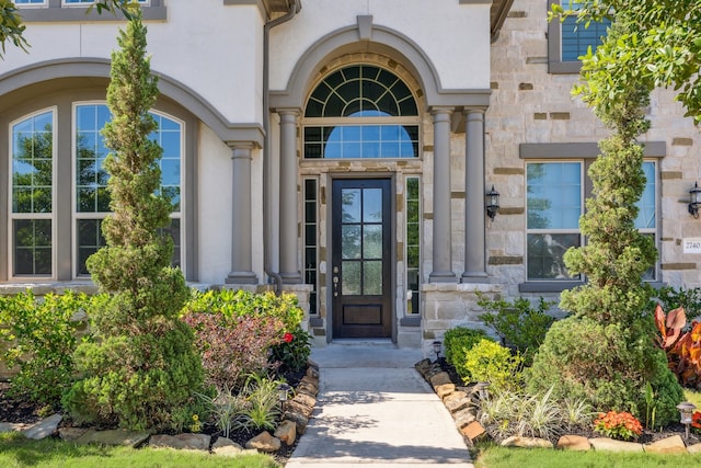 27403 Laurel Bay Ct, Katy, TX 77494 - view of exterior entry with stone siding and stucco siding