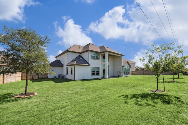 27403 Laurel Bay Ct, Katy, TX 77494 - back of property with stucco siding, central AC, and a shingled roof