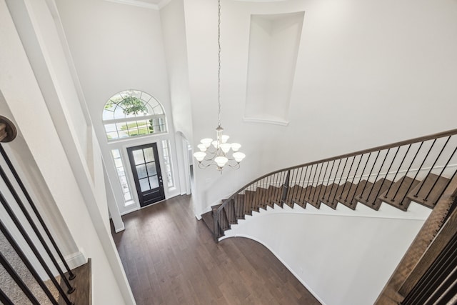 27403 Laurel Bay Ct, Katy, TX 77494 - foyer entrance with a towering ceiling, stairway, dark wood-type flooring, and a chandelier