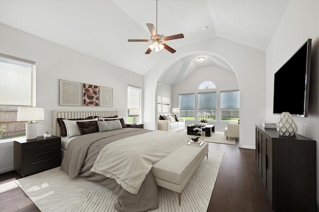27403 Laurel Bay Ct, Katy, TX 77494 - bedroom with lofted ceiling, arched walkways, dark wood-type flooring, and ceiling fan