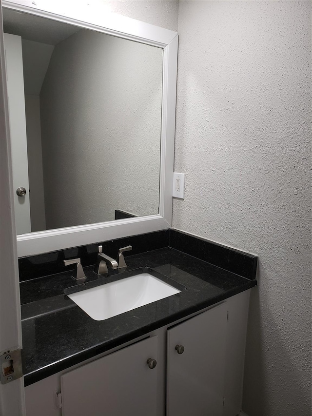 11710 Southlake Dr, Houston, TX 77077 - bathroom featuring vanity