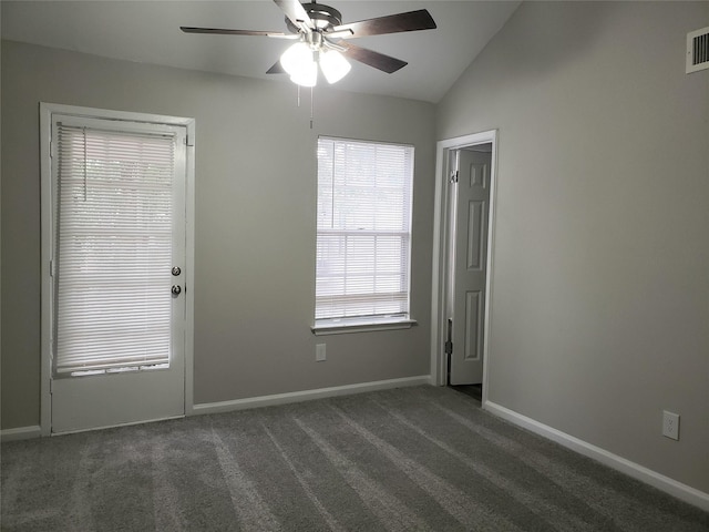11710 Southlake Dr, Houston, TX 77077 - carpeted spare room featuring ceiling fan, vaulted ceiling, and baseboards