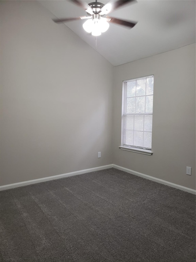 11710 Southlake Dr, Houston, TX 77077 - unfurnished room featuring a ceiling fan, lofted ceiling, dark colored carpet, and baseboards