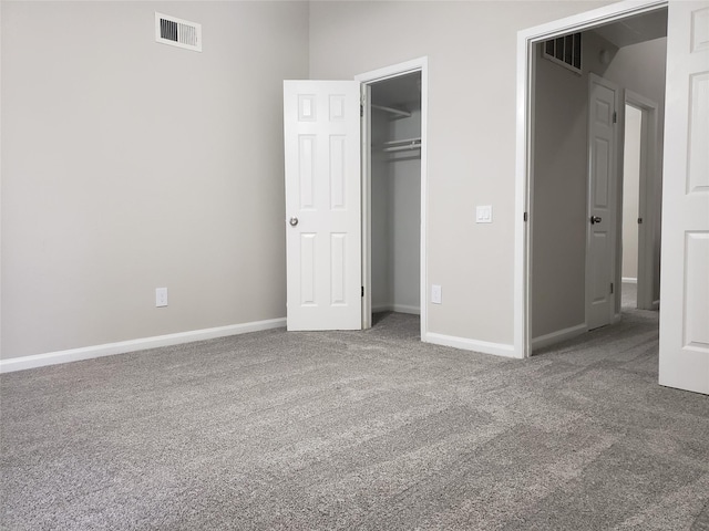 11710 Southlake Dr, Houston, TX 77077 - unfurnished bedroom with carpet flooring, baseboards, and a closet