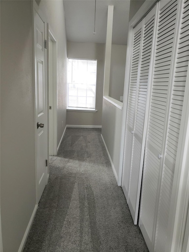 11710 Southlake Dr, Houston, TX 77077 - hallway featuring carpet and baseboards