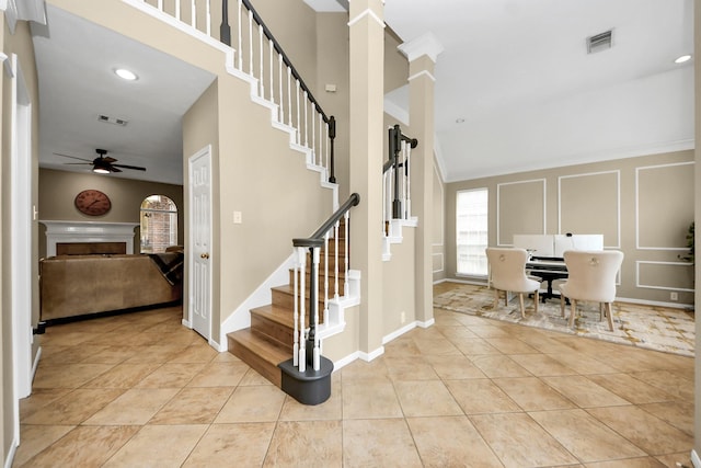 111 Knoll Forest Dr, Sugar Land, TX 77479 - entrance foyer featuring stairs, ceiling fan, tile patterned floors, high vaulted ceiling, and baseboards