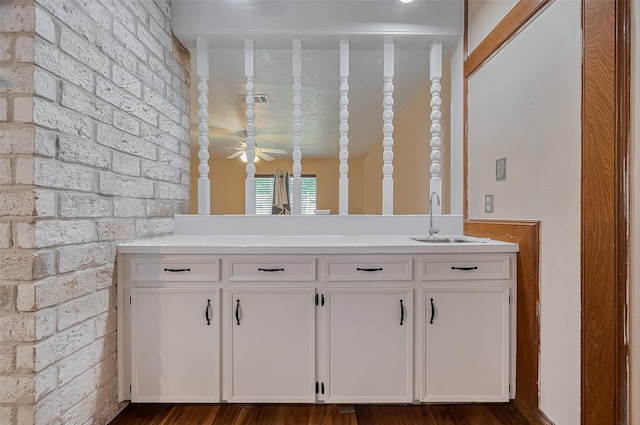 21226 Park Bend Dr, Katy, TX 77450 - bar featuring a sink, dark wood finished floors, and a ceiling fan