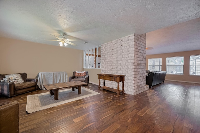 21226 Park Bend Dr, Katy, TX 77450 - sitting room with wood finished floors, a ceiling fan, a textured ceiling, and baseboards