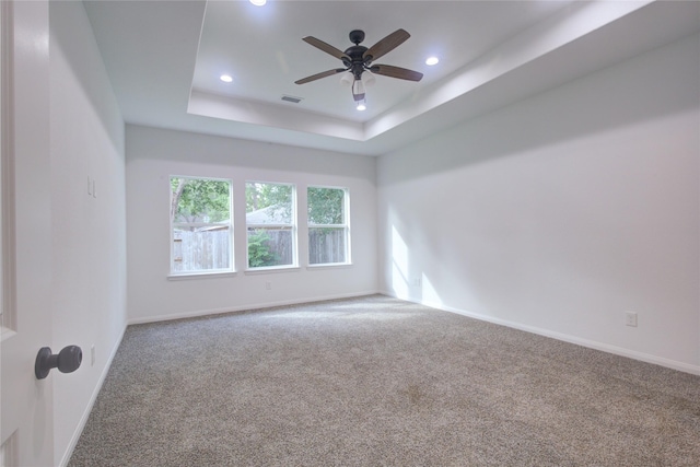 9630 Landry Blvd, Spring, TX 77379 - carpeted empty room with a ceiling fan, recessed lighting, baseboards, and a tray ceiling
