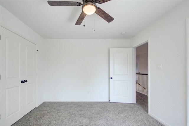 9630 Landry Blvd, Spring, TX 77379 - unfurnished bedroom featuring carpet, baseboards, and a ceiling fan