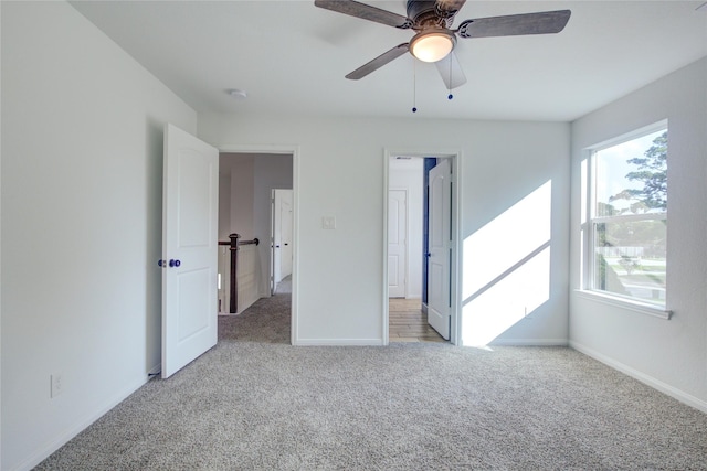 9630 Landry Blvd, Spring, TX 77379 - unfurnished bedroom featuring carpet floors, baseboards, and a ceiling fan