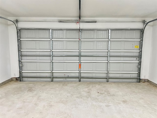 9630 Landry Blvd, Spring, TX 77379 - garage featuring baseboards