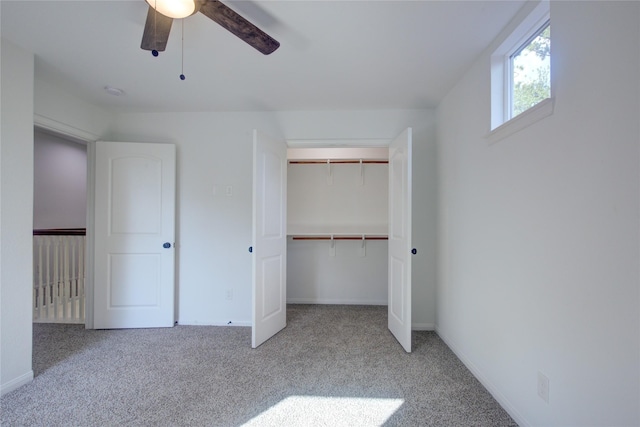 9630 Landry Blvd, Spring, TX 77379 - unfurnished bedroom featuring carpet floors, a closet, a ceiling fan, and baseboards