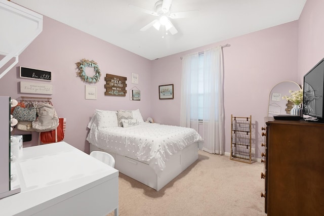 14023 Loramie Creek Ct, Houston, TX 77044 - bedroom with light carpet, a ceiling fan, and baseboards